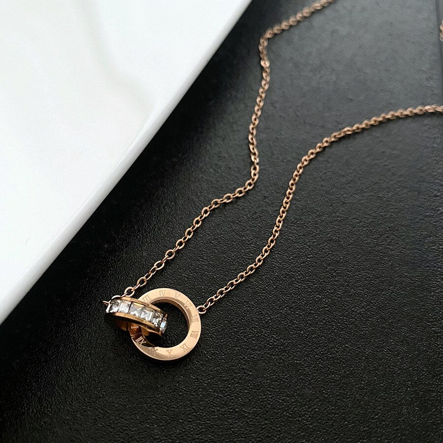 Rose Gold Roman Numeral Interlocking CZ Diamond Necklace