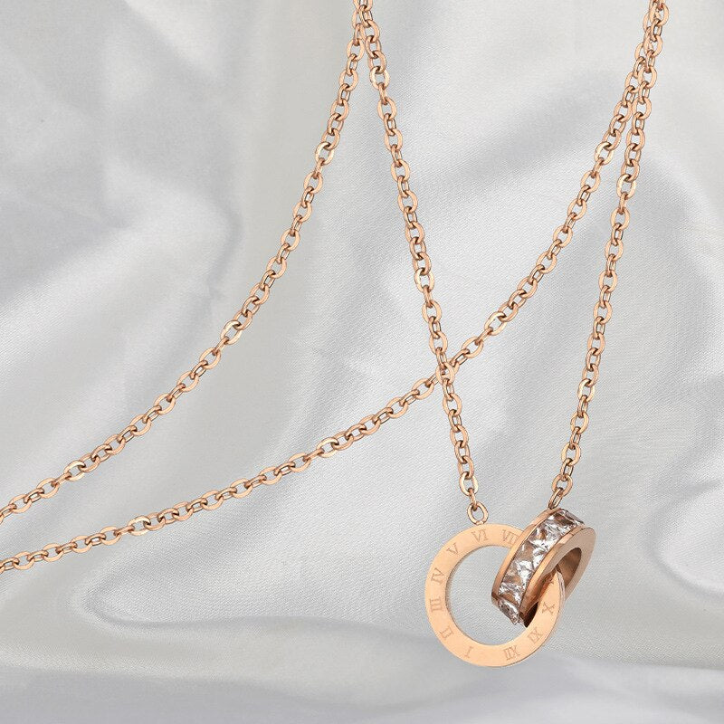 Rose Gold Roman Numeral Interlocking CZ Diamond Necklace